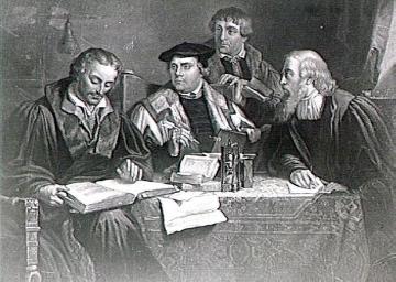 Martin Luther übersetzt im Kreis von Mitarbeitern die Bibel