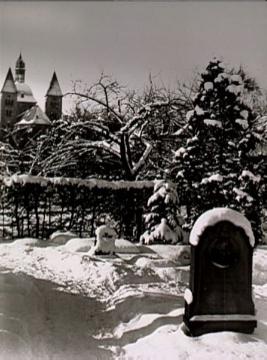 Verschneiter Mauritz-Friedhof mit Blick zur kath. Pfarrkirche St. Mauritz, um 1930?