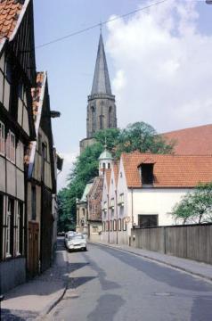 Telgte, 1962: Fachwerkhäuser an der Kardinal von Galen-Straße mit Blick auf die St. Clemens-Kirche