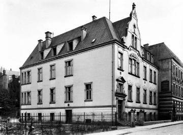 Kreishaus Münster, Achtermannstraße 19 - angeschnitten: Webwarengroßhandlung J. Reuter, um 1920?