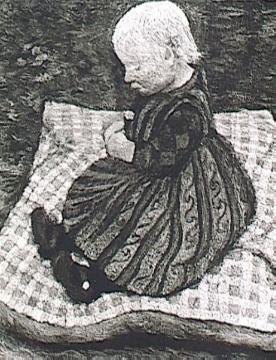 Kind auf rotgewürfeltem Kissen: um 1904, Gemälde von Paula Modersohn-Becker