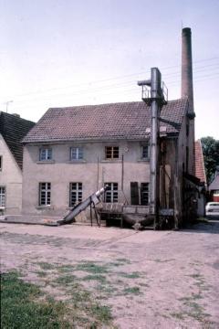Industrie in Saerbeck, 1965: Brennerei Dahlmöller, hofseitige Rückansicht, Betrieb bis 1976, ab 1990er Jahre technisches Baudenkmal und Brennereimuseum