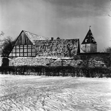 Fachwerkhaus mit Bruchsteinmauer am Stadttor in Stromberg