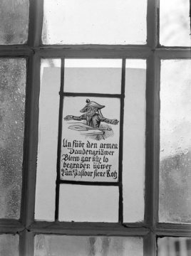 Fensterbierscheibe an einer Gaststätte in Münster