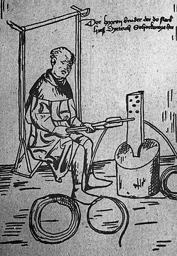 Darstellung eines drahtziehenden Mönches (Holzschnitt)