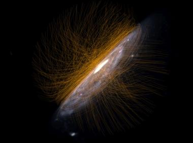 Die Milchstraße mit ihrem Magentfeld (goldene Linien) wie es in den aktuellsten Simulationen modelliert wurde, wird in der neuen Show "Unser exotisches Universum" gezeigt.<br>Bild: LWL/Jogler