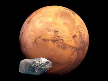 Der Mars mit dem Meteoriten ALH 84001, gefunden am Südpol, der möglicherweise Spuren von Lebewesen enthält. <br>Foto: LWL/Egbert