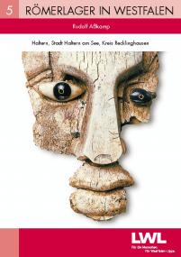 Band 5 ¿Haltern¿ der Reihe ¿Römerlager in Westfalen¿. Das Titelbild zeigt eine acht Zentimeter lange Maske aus Bein mit Glasaugen ¿ gefunden auf dem römischen Gräberfeld in Haltern. <br>Foto: LWL/S. Brentführer<br />