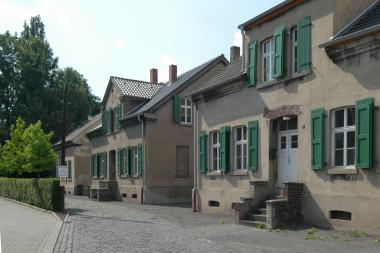 Die Arbeiterhäuser am Rübenkamp sind erste Station der Geschichtstour unter dem Motto ¿Wohnen auf der Seilscheibe¿.<br>Foto: LWL/Hudemann 