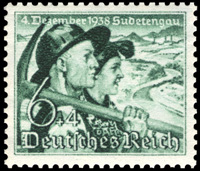 Briefmarkenausgabe des Deutschen Reichs, Ergänzungswahl des Sudetenlandes (Reichstagswahl vom 10.04.1938), '4. Dezember 1938 Sudetengau', darstellend einen Mann und eine Frau aus dem Egerland, 02.12.1038 / Quelle: Wikimedia Commons PD / Michel Junior-Katalog 1999, Deutsches Reich […], München 1997, S. 46 (Nr. 684f.)